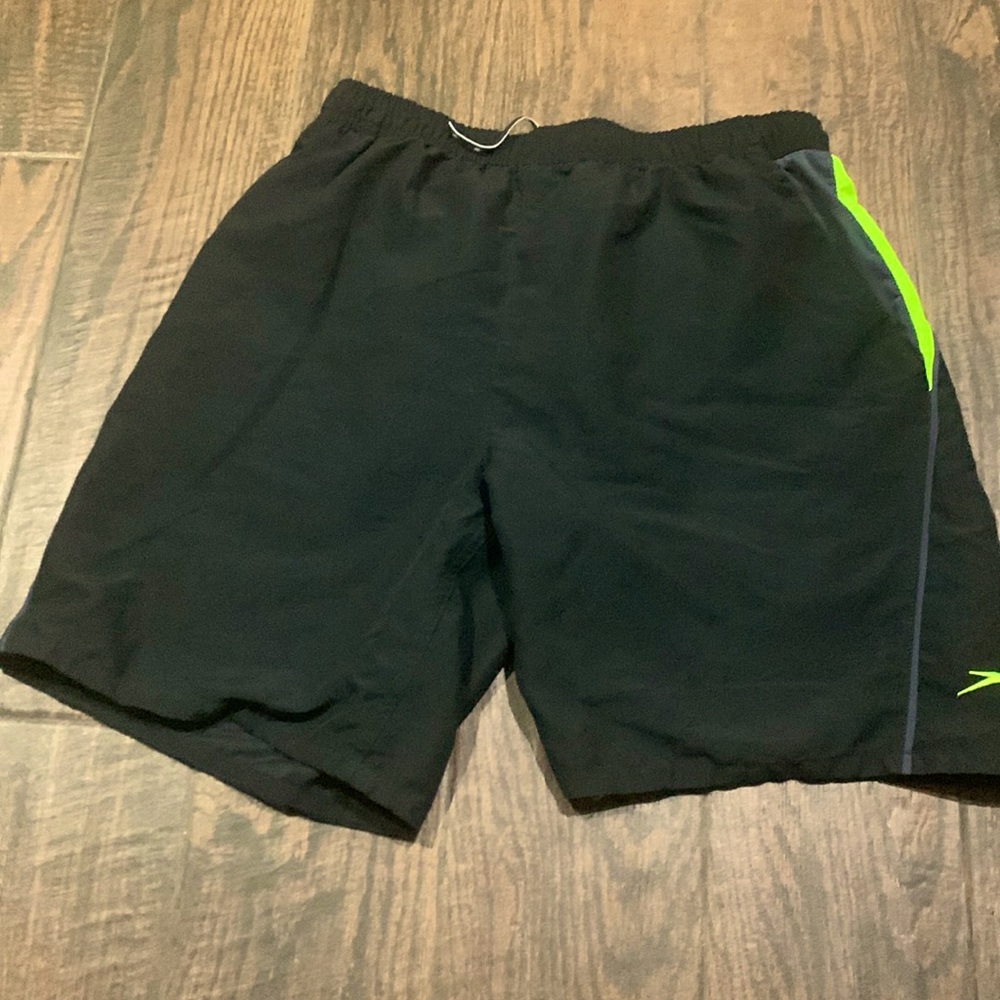Bright yellow speedo swim shorts